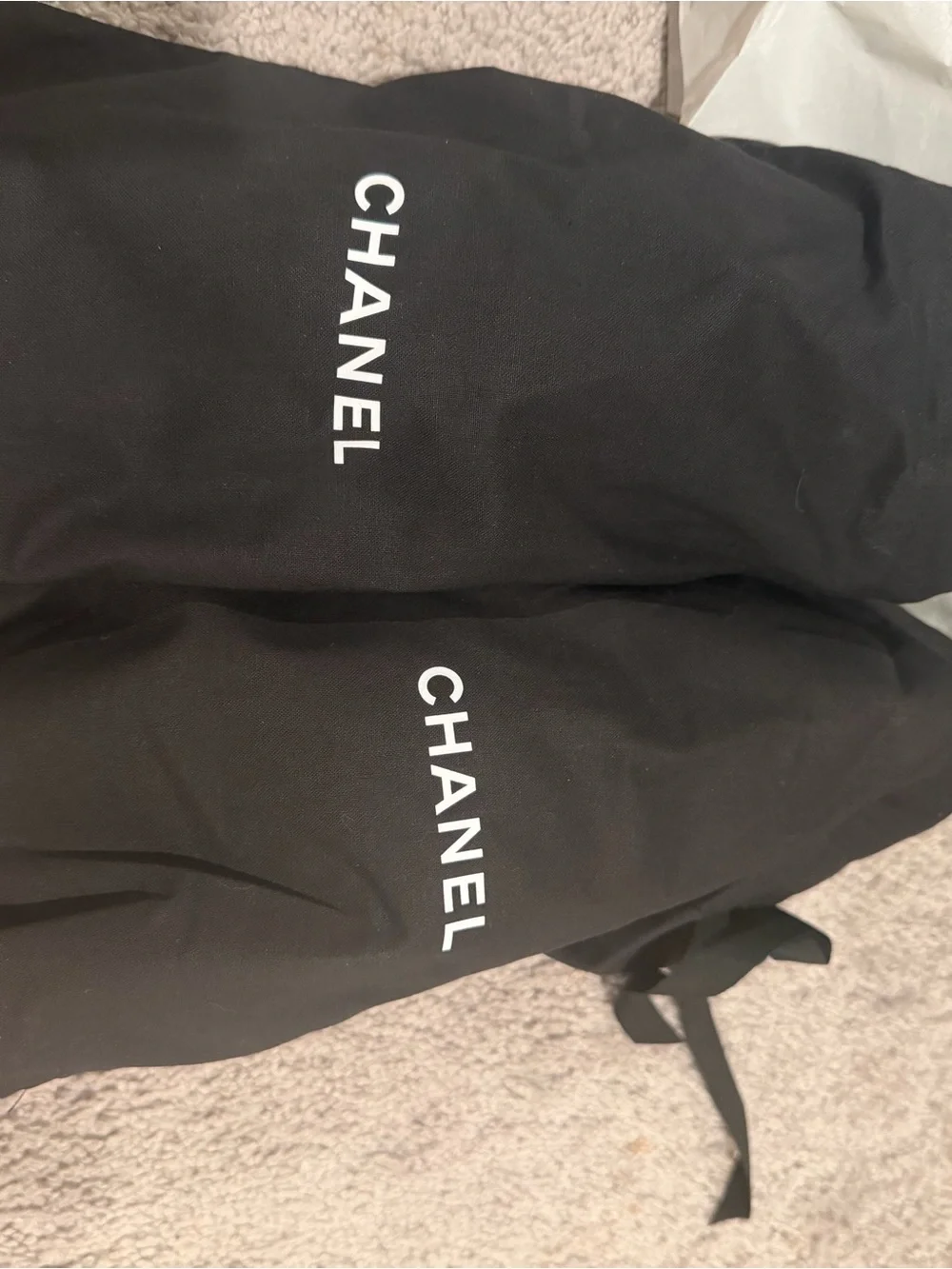 CHANEL Black Leather Loafers with Gold Heart Accent